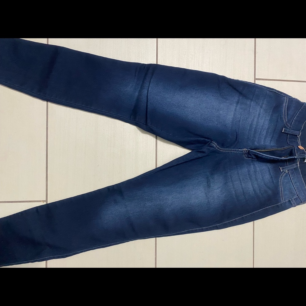 High rise blue jeans